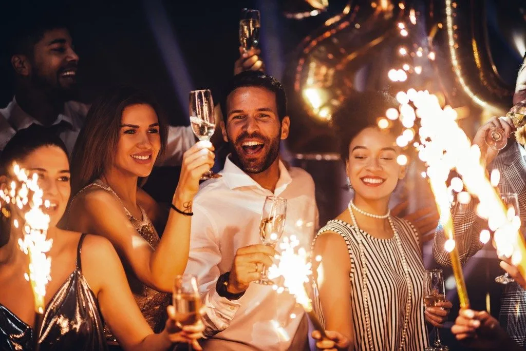Guests celebrating with champagne and sparklers